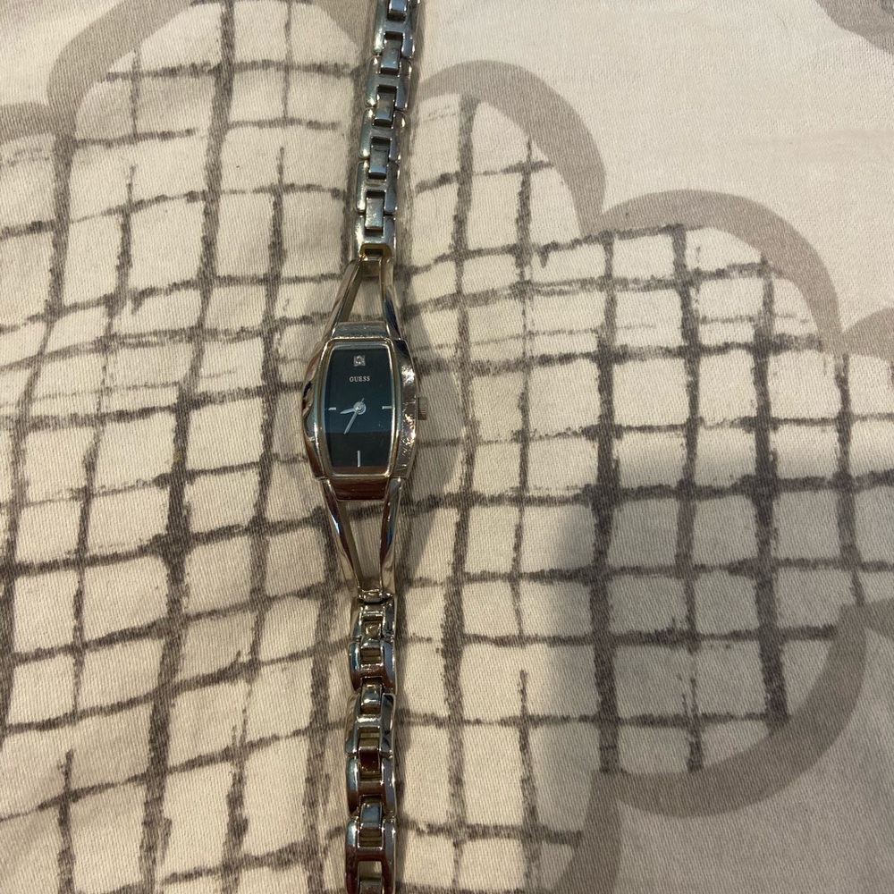 Stunning silver guess watch with diamond accent